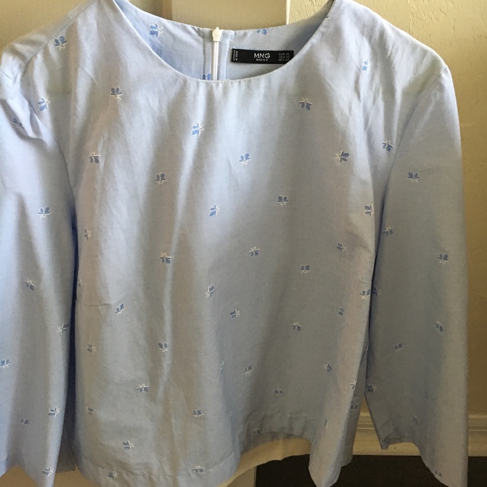 Cute MNG baby blue top.